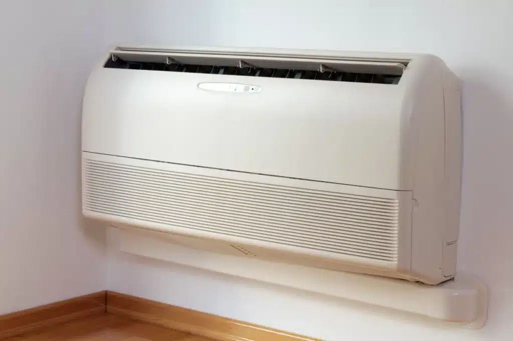 Système de climatisation installé au sol dans un intérieur moderne, combinant design et performance